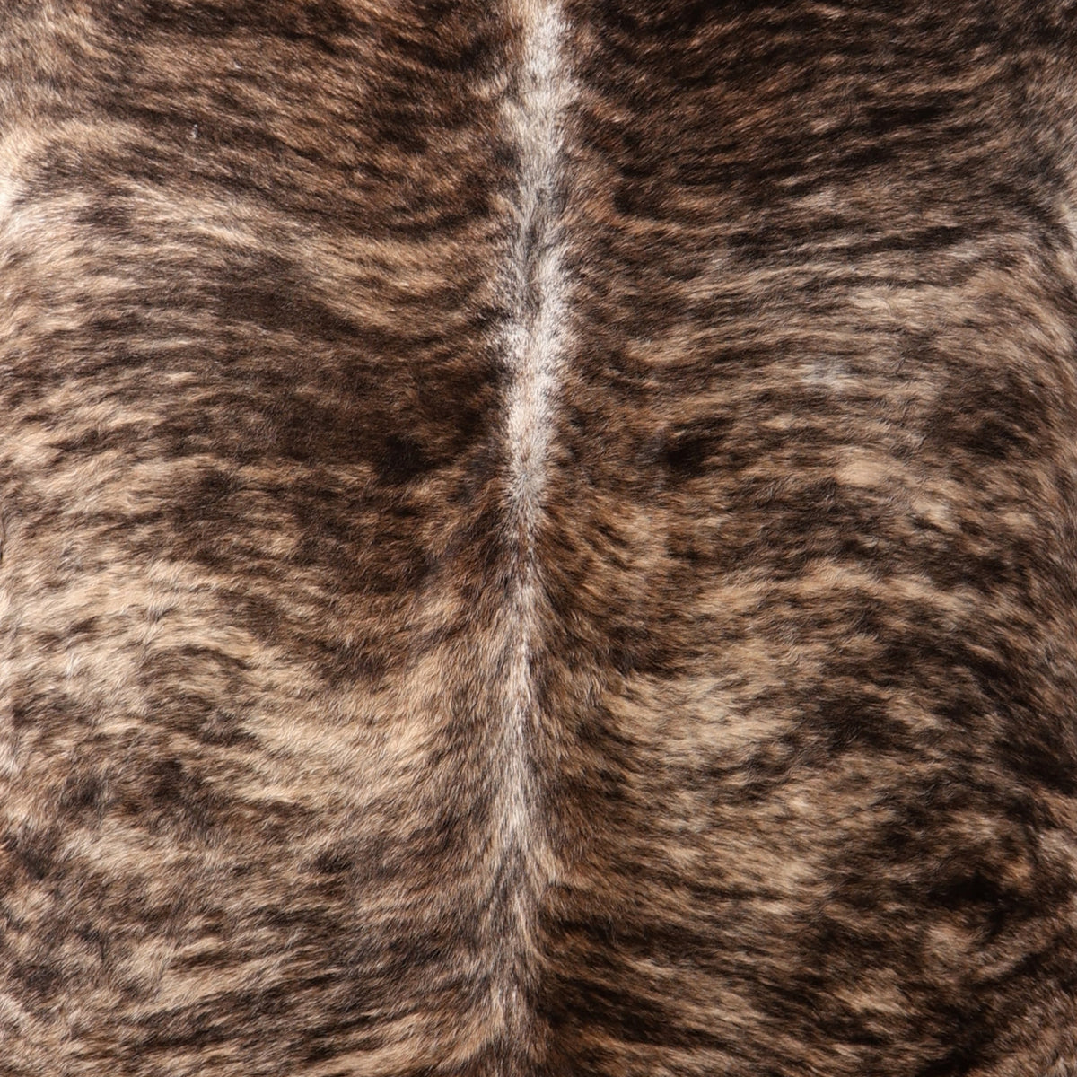 A close-up of a brindle nguni cowhide rug 