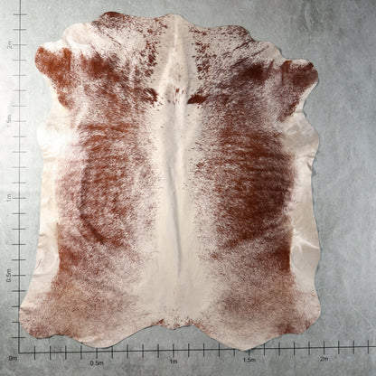 Genuine South African Nguni hide AAS8313 in cream and chestnut brown with fine speckled markings.