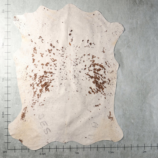 Cream and brown lightly spotted genuine South African Nguni cowhide BGS2743 with delicate scattered natural markings