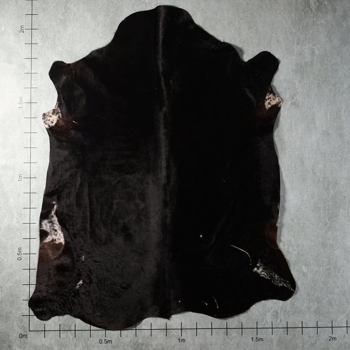 Predominantly solid black genuine South African Nguni cowhide – BGD4930