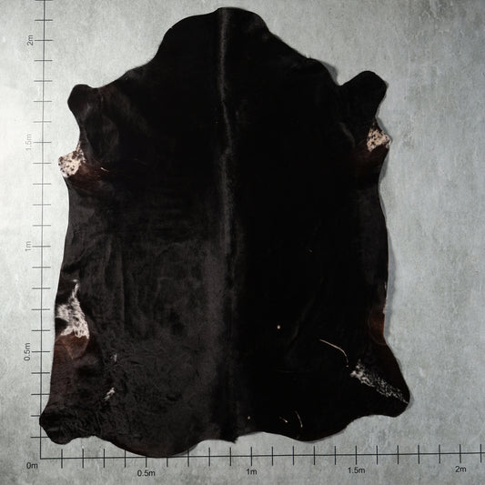 Predominantly solid black genuine South African Nguni cowhide – BGD4930